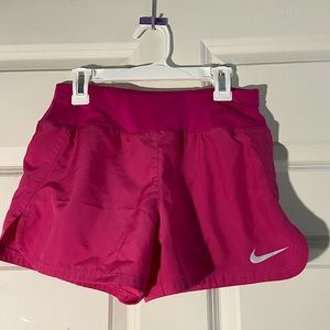 Selling pink athletic nike shorts, never worn